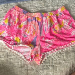 Lilly Pulitzer pink and purple shorts for girls.
